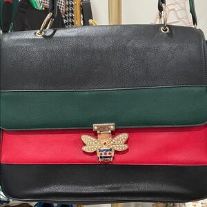 Elegant Black and Red Handbag with Bee Accent